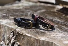 Load image into Gallery viewer, This adjustable leather bracelet makes a perfect gift for a child or teanager.  It can be worn as small as 5 3/4&quot; or be adjusted to a wrist bracelet of 7 1/4&quot;.  
