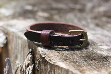 Load image into Gallery viewer, This adjustable leather bracelet makes a perfect gift for a child or teanager.  It can be worn as small as 5 3/4&quot; or be adjusted to a wrist bracelet of 7 1/4&quot;.  
