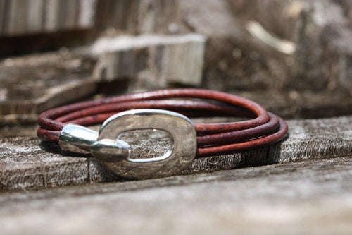 This multi strands bracelet lends a touch of shine and edge to your look.